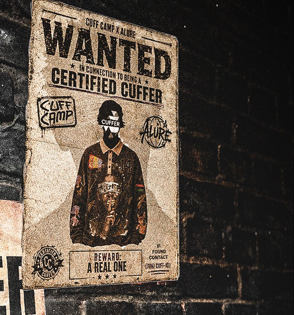 Three vintage-style 'Certified Cuffer' posters with illustrated figures in masks and jackets are displayed against a dark brick wall. The posters feature distressed typography and aged paper tones.